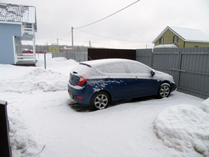 Y mi coche (carro) fue cubierto con nieve también.